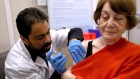 COVID vaccine works faster with both doses in the same arm